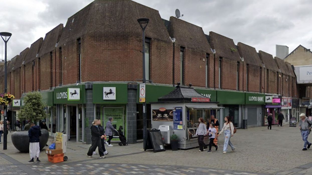 Lloyd's customer stabbed to death inside Derby branch - as two men arrested