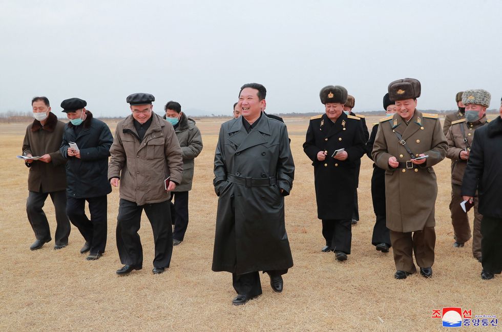 North Korean leader Kim Jong Un inspects the proposed building site for the Ryonpho Vegetable Greenhouse Farm in the Ryonpho area of Hamju County, North Korea.