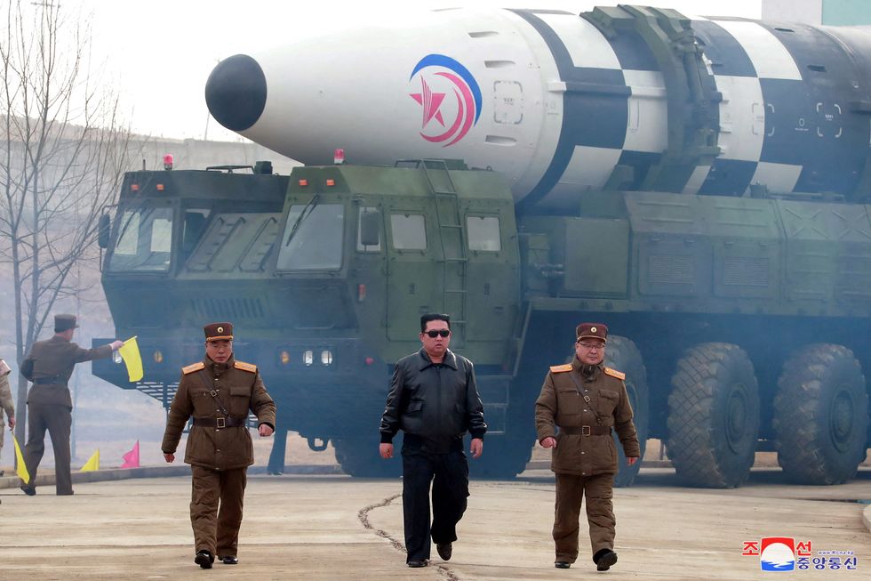 North Korean leader Kim Jong Un walks away from what state media report is a %22new type%22 of intercontinental ballistic missile (ICBM) in this undated photo released on March 24, 2022 by North Korea's Korean Central News Agency (KCNA). KCNA via REUTERS ATTENTION EDITORS - THIS IMAGE WAS PROVIDED BY A THIRD PARTY. REUTERS IS UNABLE TO INDEPENDENTLY VERIFY THIS IMAGE. NO THIRD PARTY SALES. SOUTH KOREA OUT. NO COMMERCIAL OR EDITORIAL SALES IN SOUTH KOREA. TPX IMAGES OF THE DAY