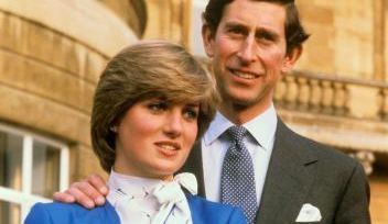 Note to Editors:  This picture transmitted 17 August 1998 to accompany package of stories in advance of the first anniversary of the death of Diana, Princess of Wales. Library filer ref 4254-8, dated 24.2.81, of the Prince of Wales and Lady Diana Spencer in the grounds of Buckingham Palace after announcing their engagement.