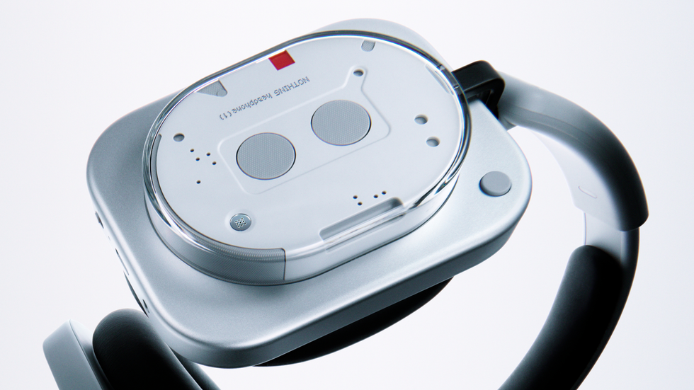 nothing headphone (1) in white with the transparent earcup on show