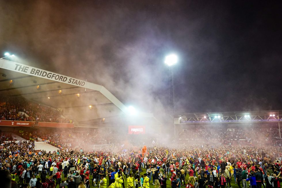 Nottingham Forest fans took to the pitch after their playoff victory against Sheffield United.