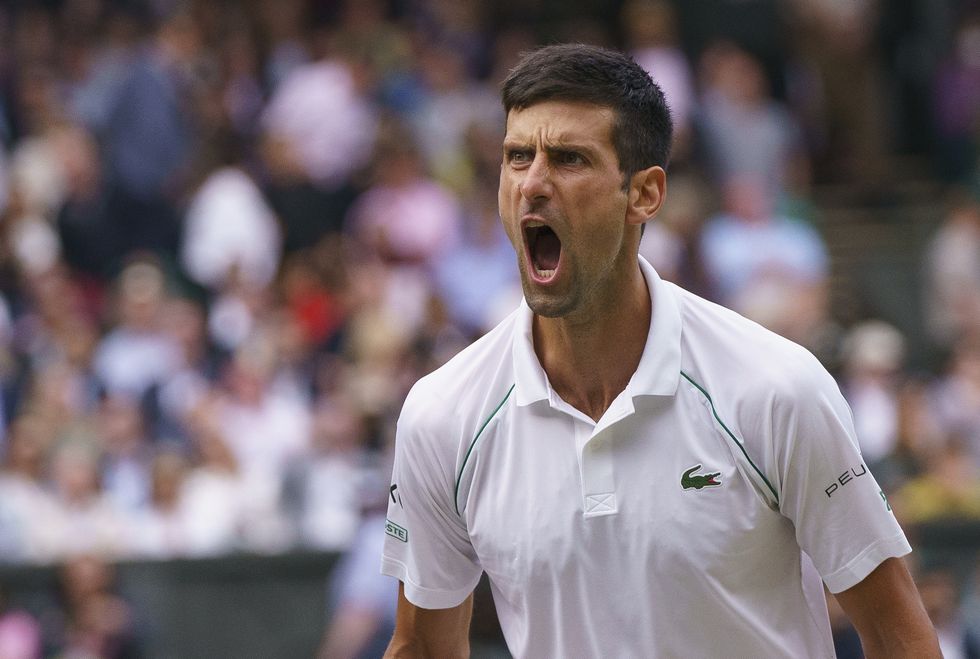 Novak Djokovic celebrates victory against Denis Shapovalov in the mens' singles semi-final on centre court on day eleven of Wimbledon at The All England Lawn Tennis and Croquet Club, Wimbledon. Picture date: Friday July 9, 2021.