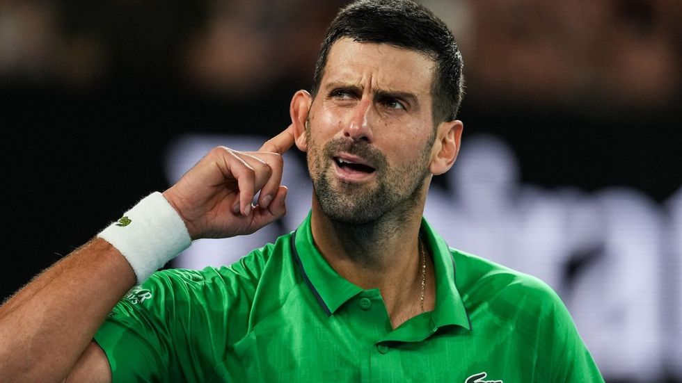 Novak Djokovic has acknowledged he was fortunate to remain in the Australian Open after a moment of frustration nearly saw him thrown out of the tournament