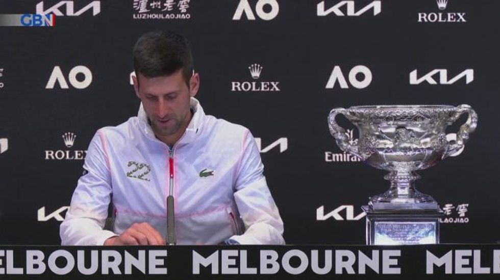 Novak Djokovic equals all-time Grand Slam record at Australian Open just a year after being DEPORTED for refusing to have the COVID vaccine