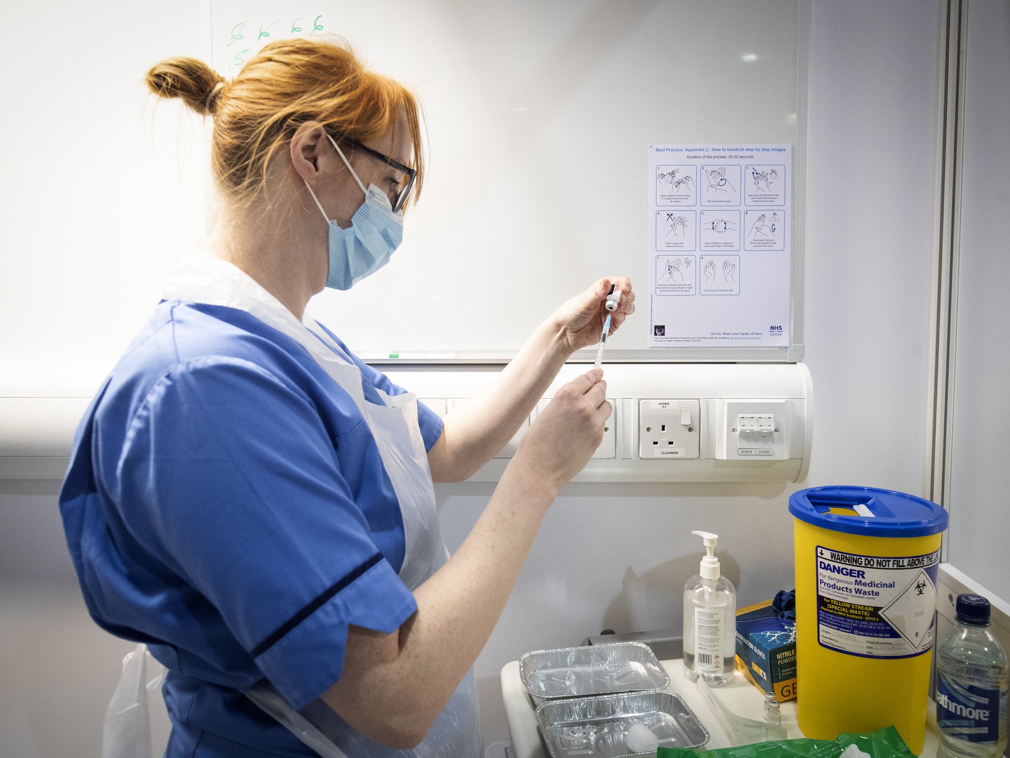 Nurse preparing another Covid jab.
