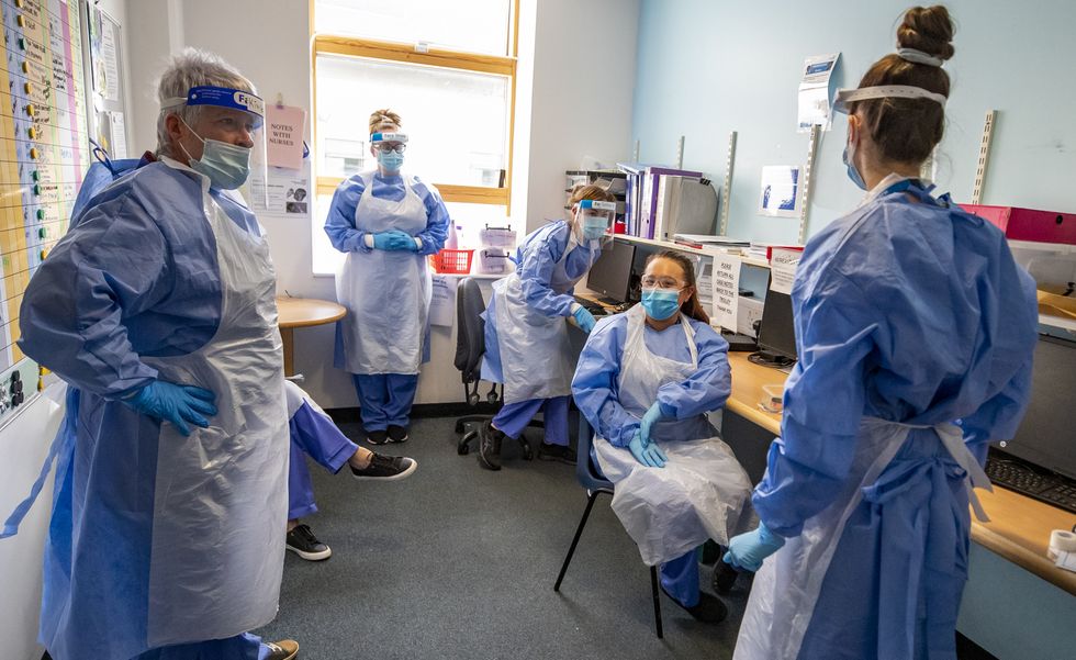 Nurses holding a meeting in a Scottish hospital.