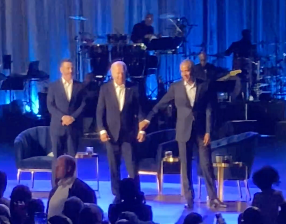 Obama grabs Biden's arm