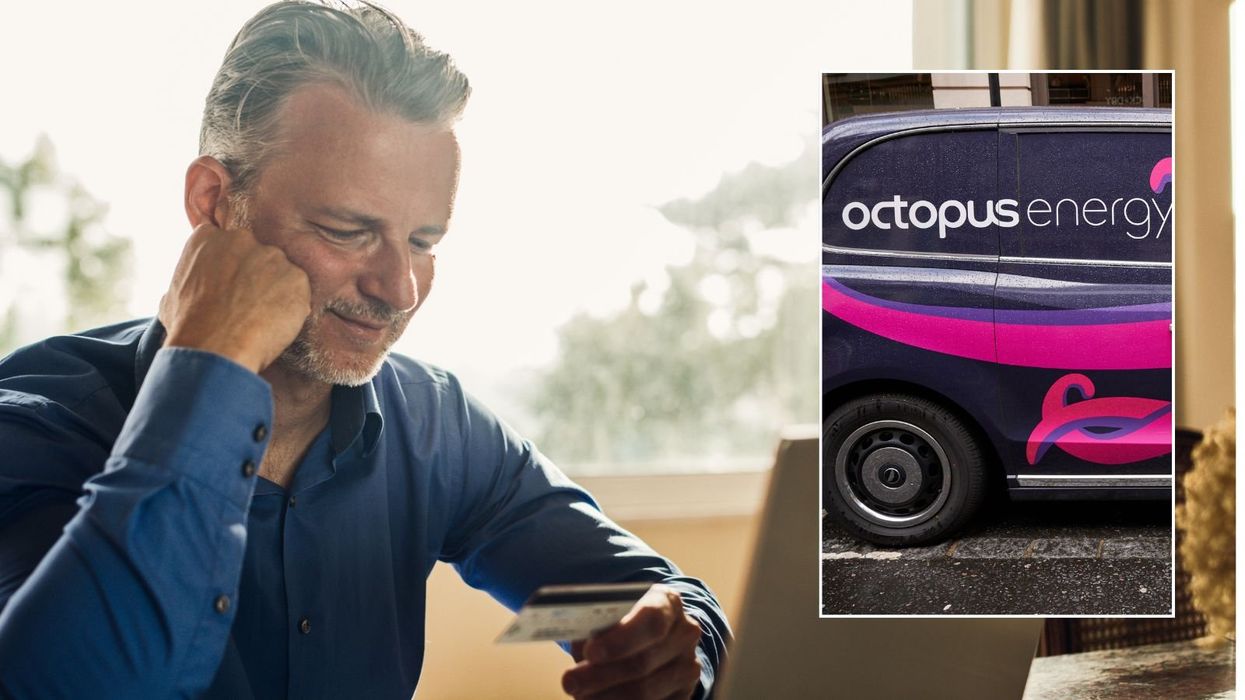 Octopus Energy van and man looking at debit card