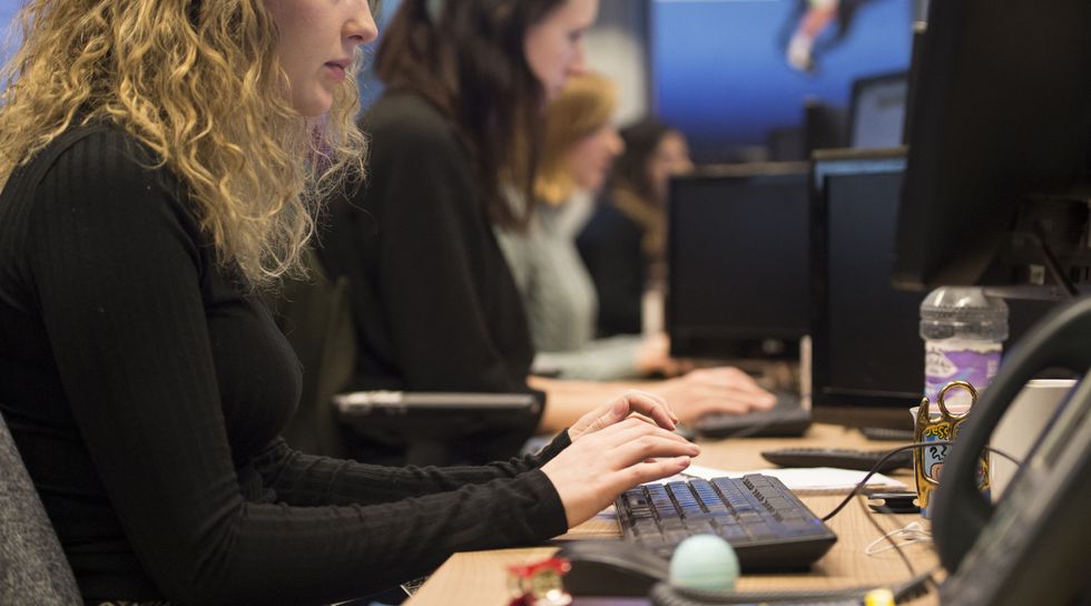 Office workers at their desks in London