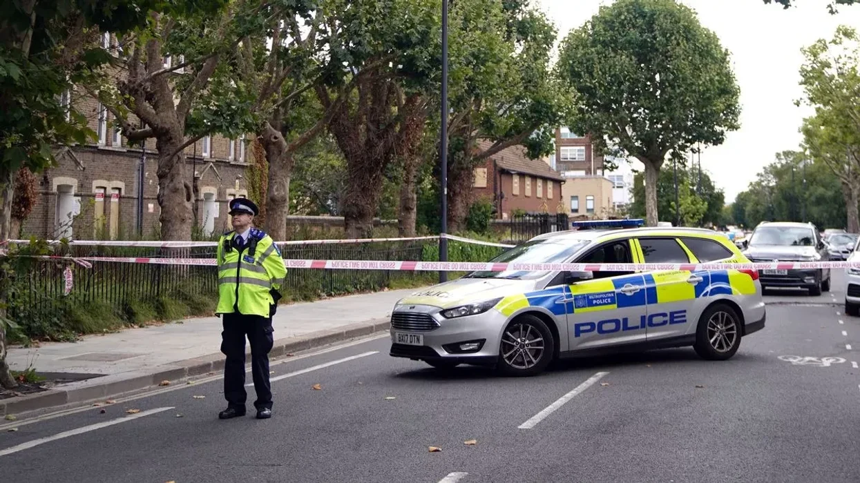 Officers at the scene after a teenager dies after being struck by train in Hammersmith