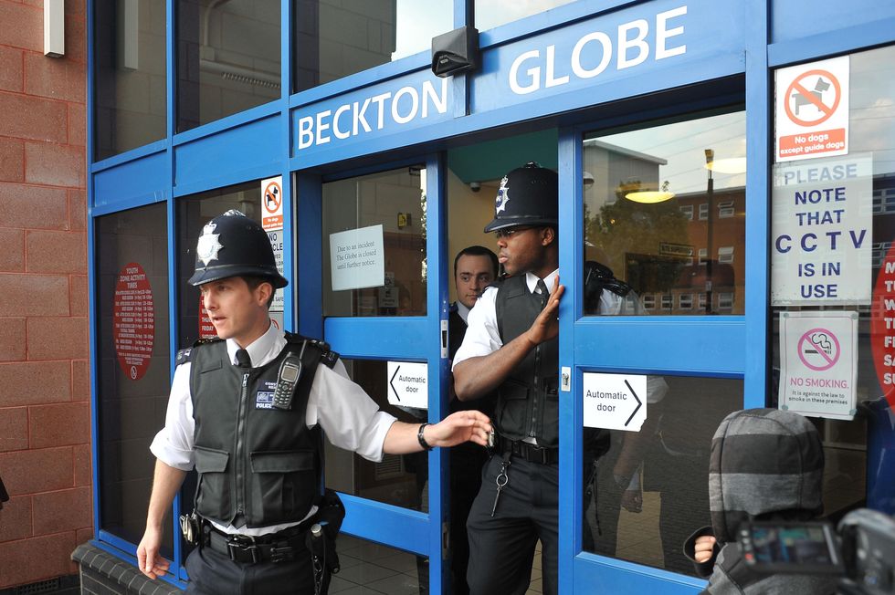 Officers attend the scene in Beckton, east London