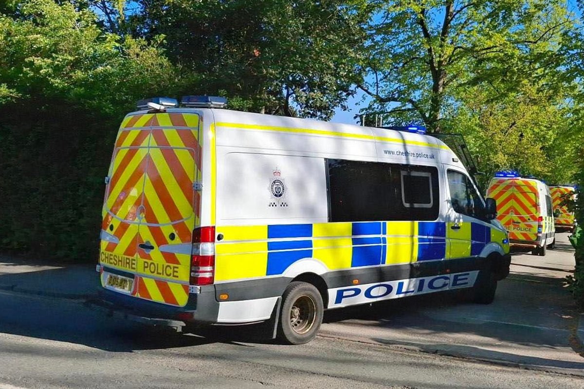 Officers attending a property in Crewe