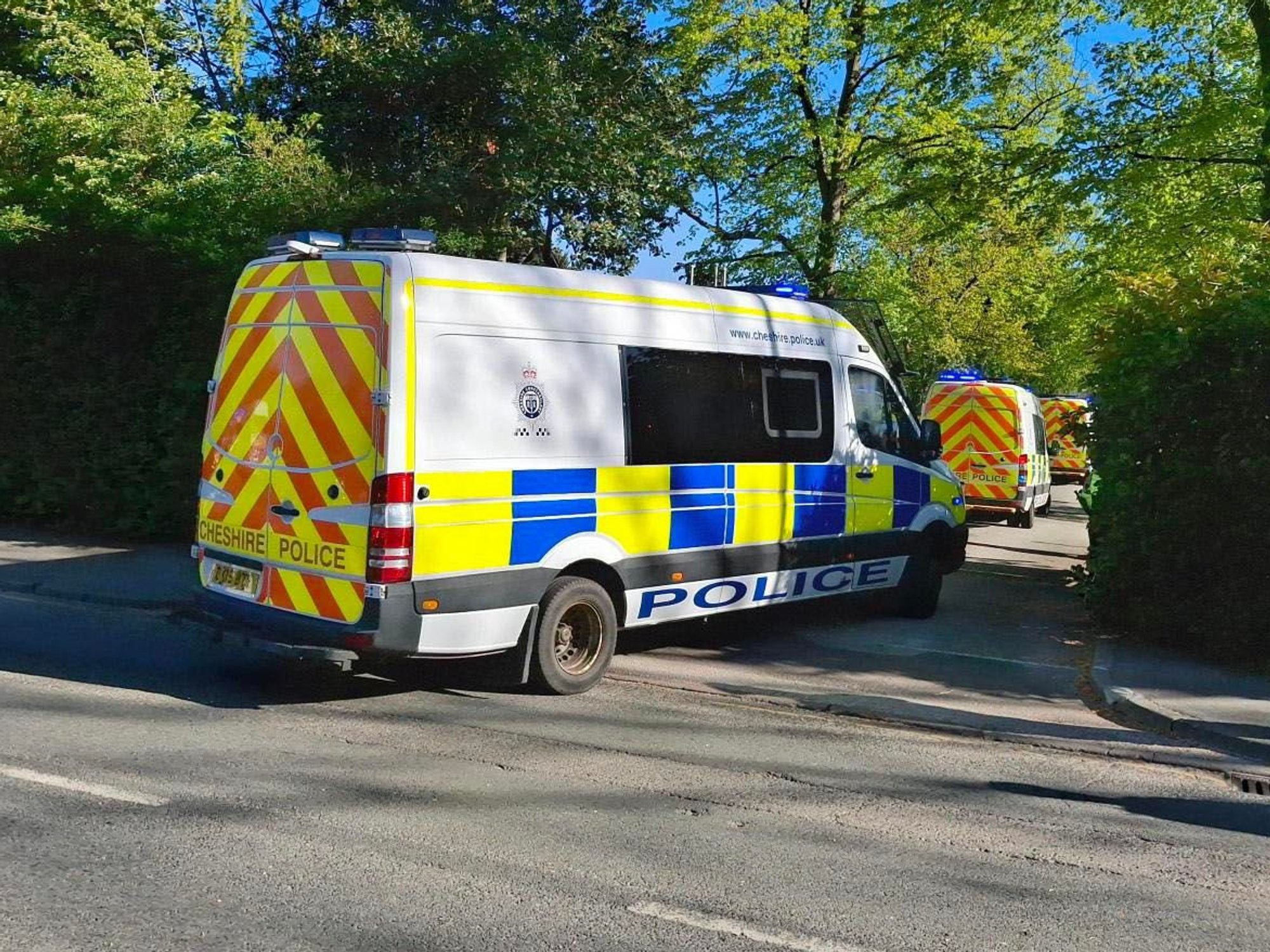 Officers attending a property in Crewe