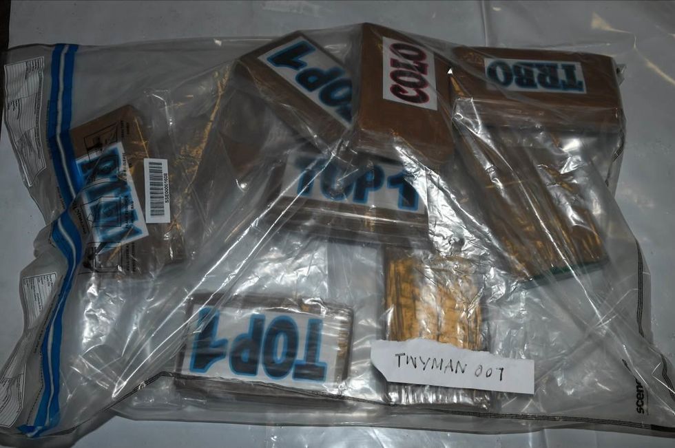 Officers found six metal box sections going across the width of the bulkhead, containing 45 kilos of cocaine in brown taped packages.