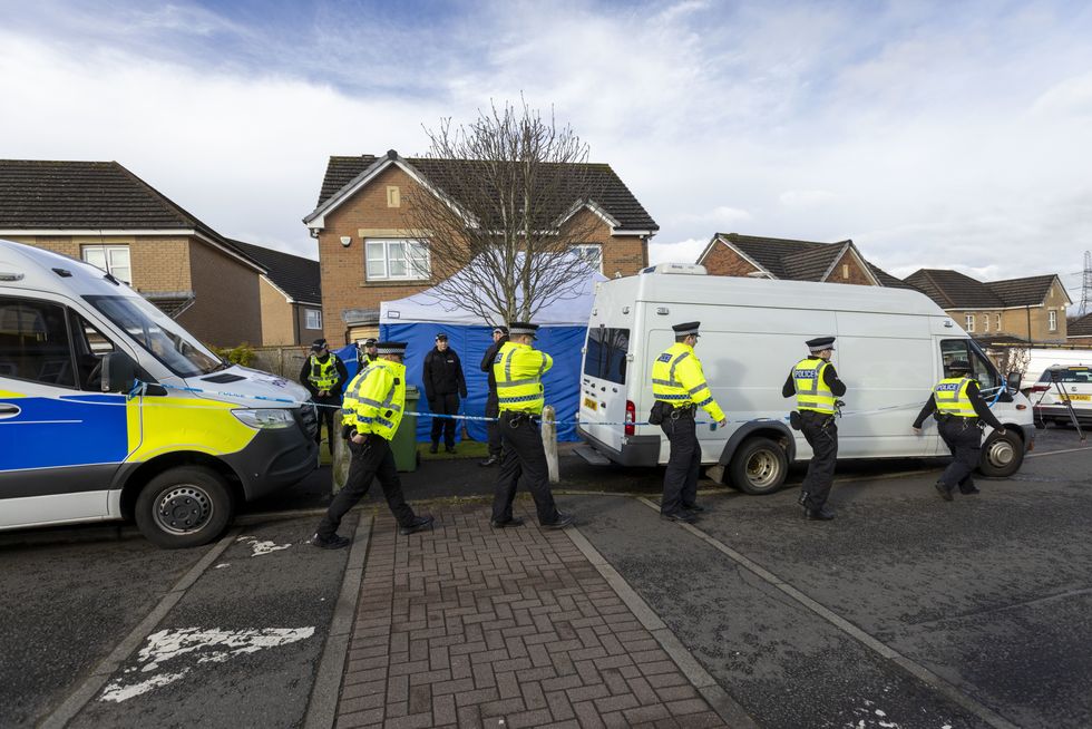 Officers outside the home of Nicola Sturgeon