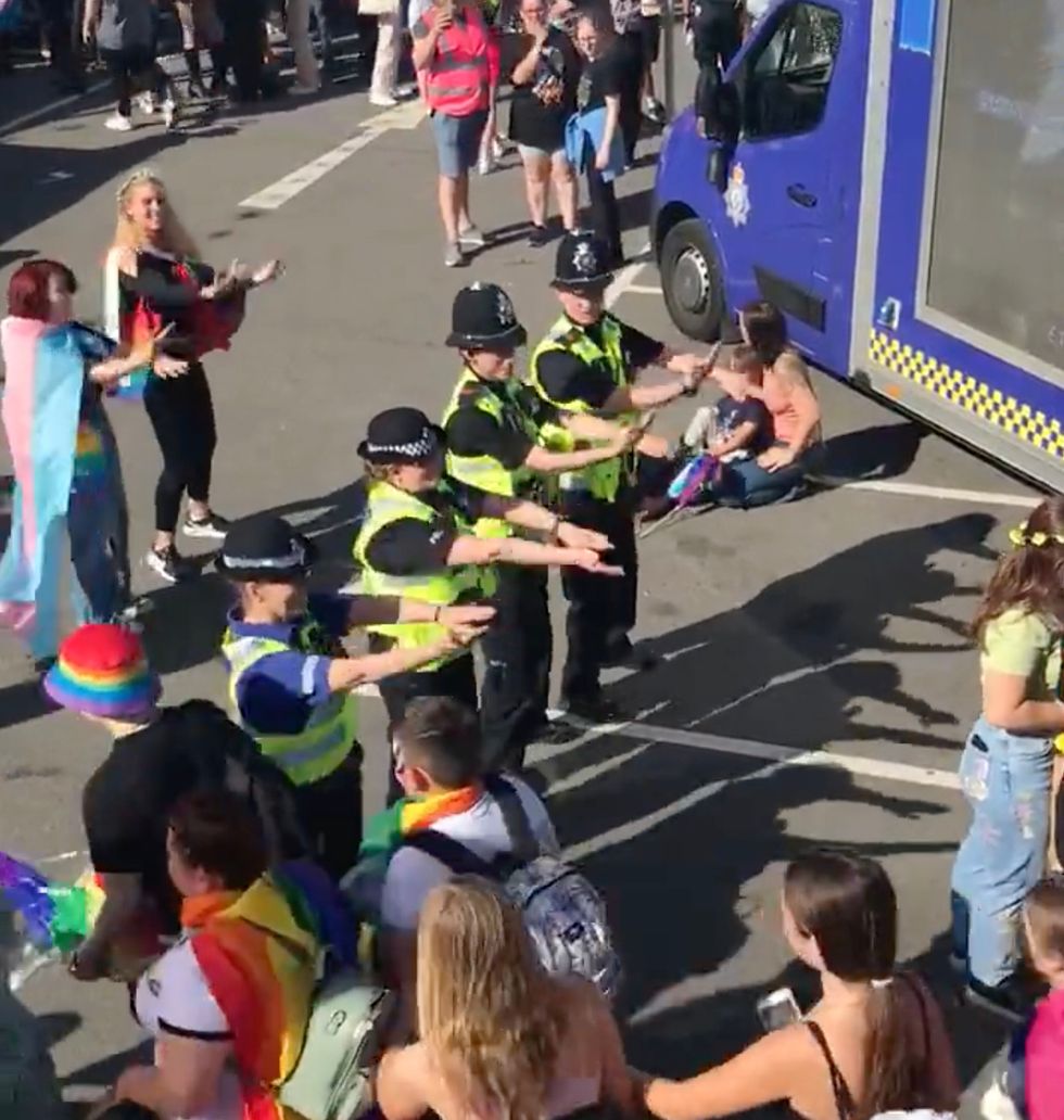 Officers were seen performing the Macarena