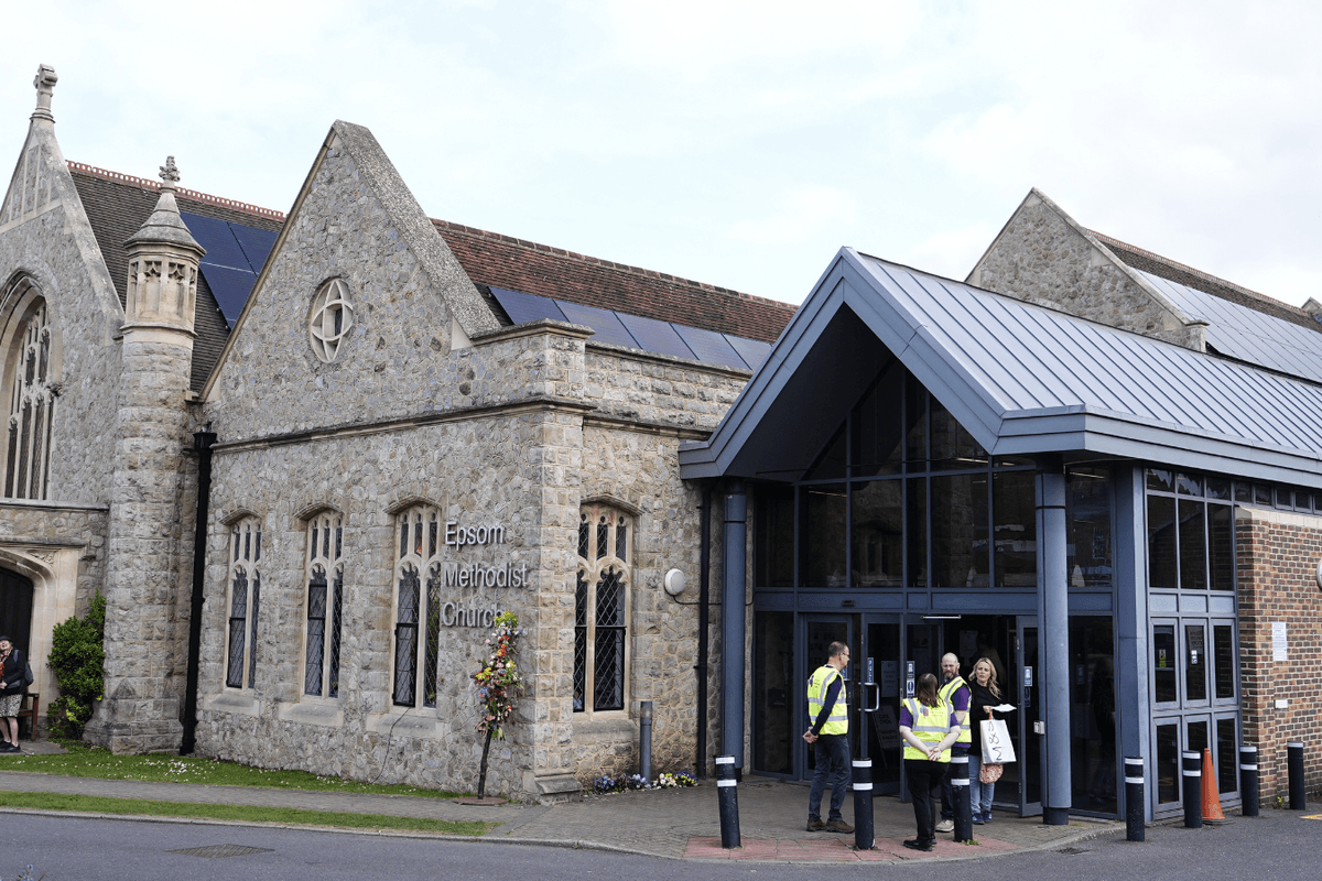 Officials gathered outside Epsom Methodist Church