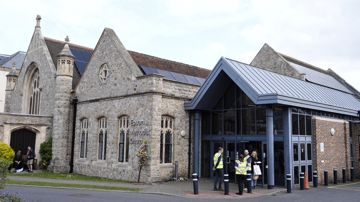 Officials gathered outside Epsom Methodist Church
