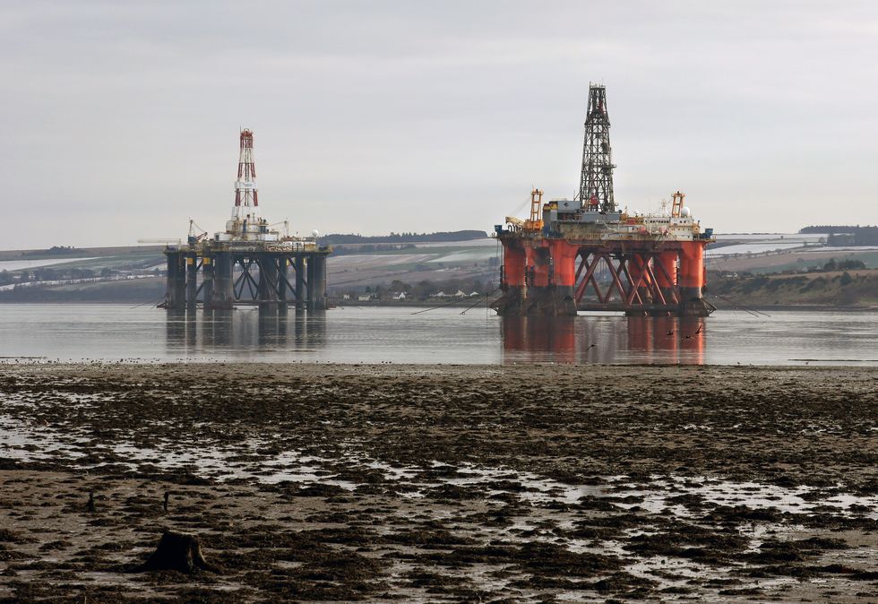 Oil platforms stand amongst other rigs which have been left in the Cromarty Firth near Invergordon in the Highlands of Scotland
