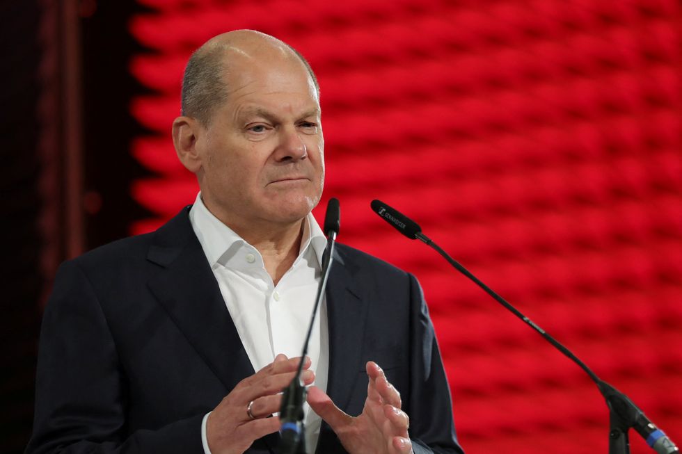 Olaf Scholz has made the pledge to commit tanks to Ukraine amid Nato pressure