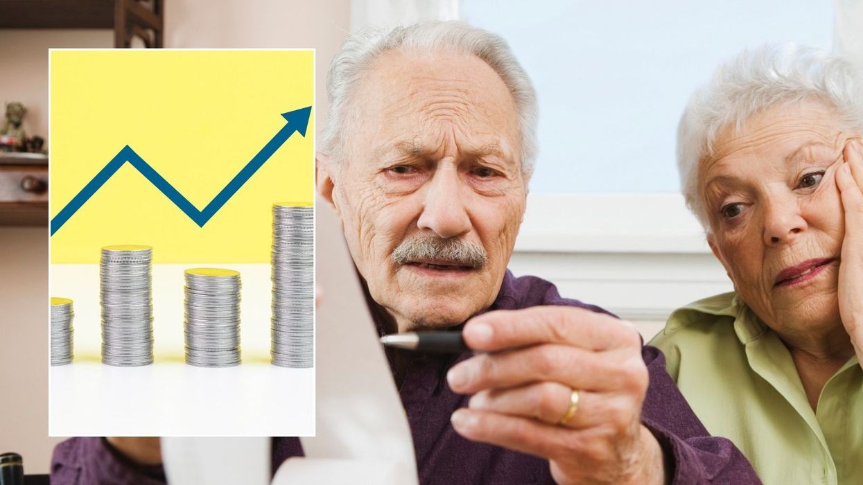 Older couple and line graph rising