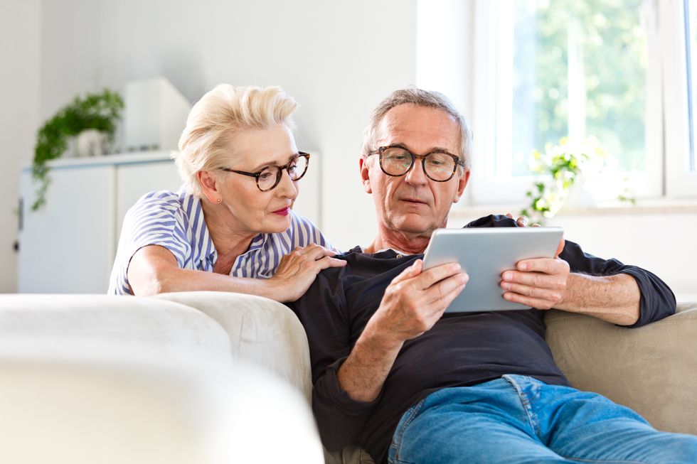Older couple looking at tablet