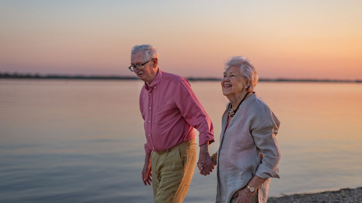 Older couple on the beach on holiday