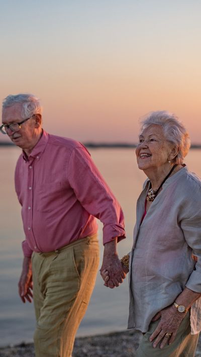 Older couple on the beach on holiday
