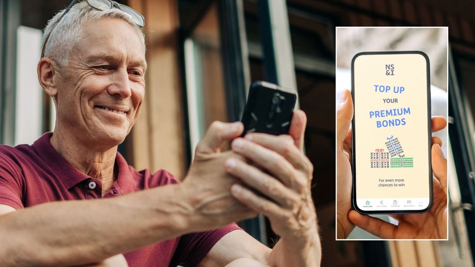 Older man and Premium Bonds on phone