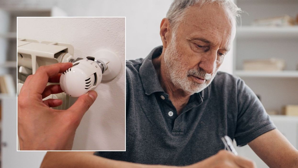 Older man filling out form and radiator