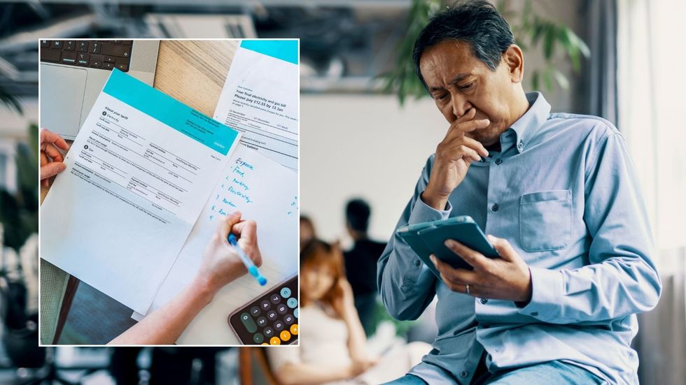 Older man looking worried and energy bill