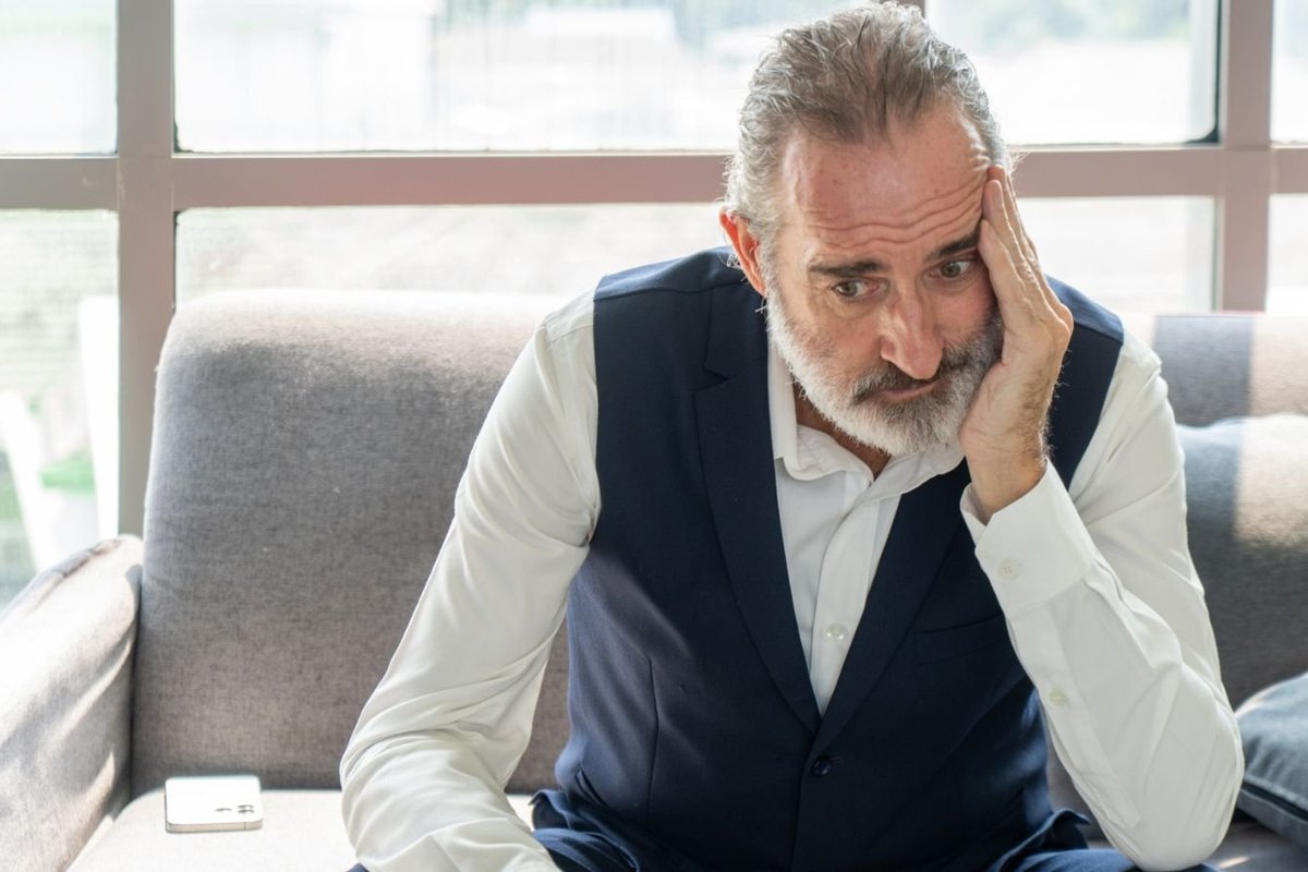 Older man looking worried
