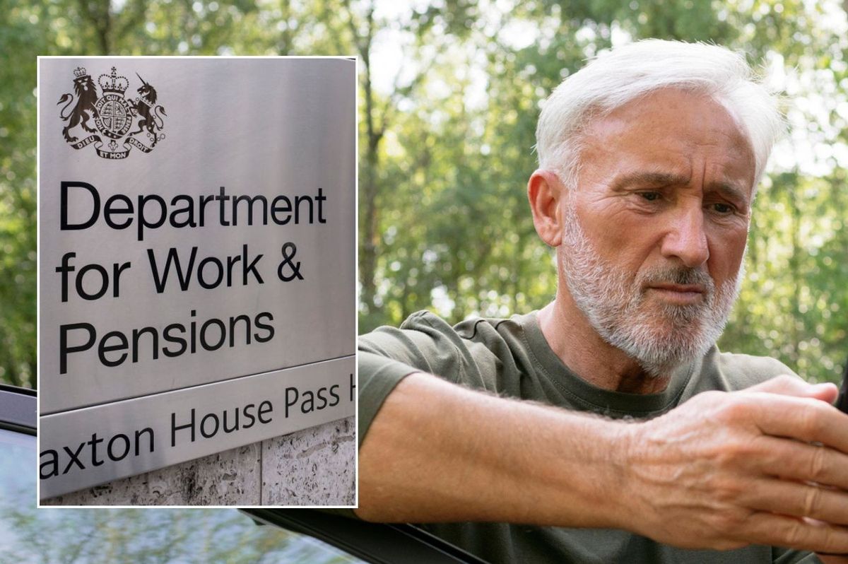 Older man on form and DWP sign