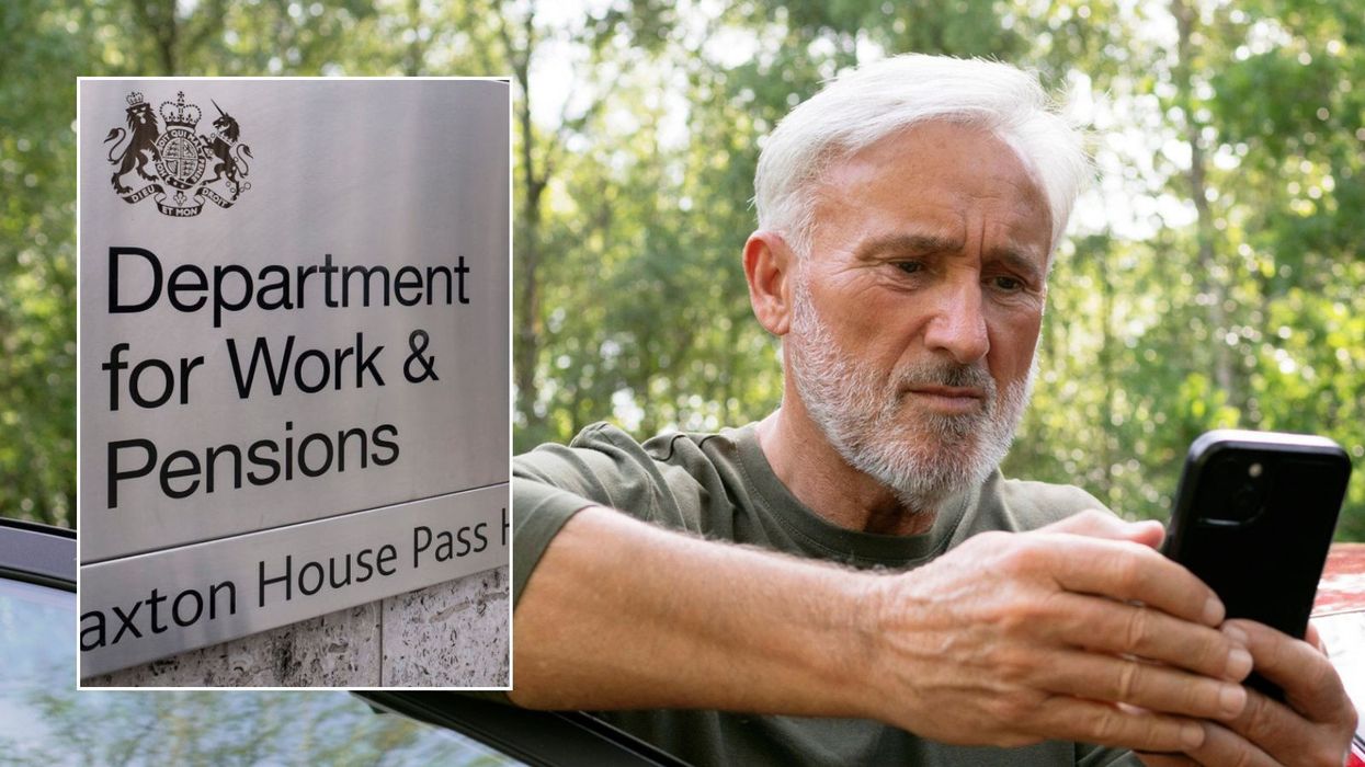 Older man on form and DWP sign