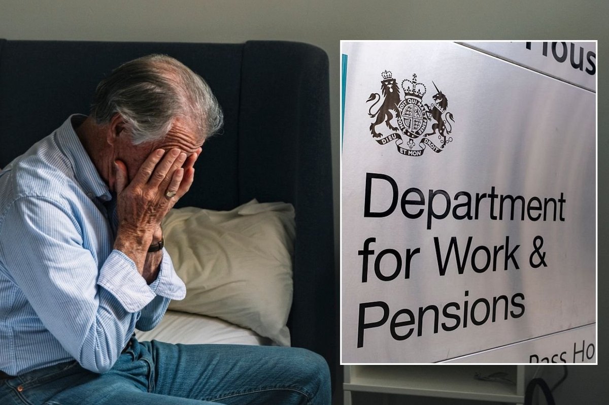 Older man worried and DWP sign
