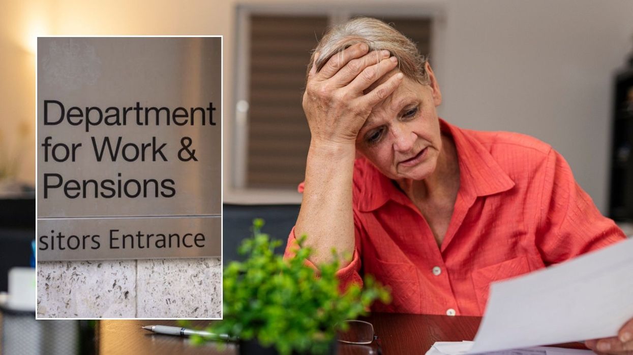 Older woman and DWP sign