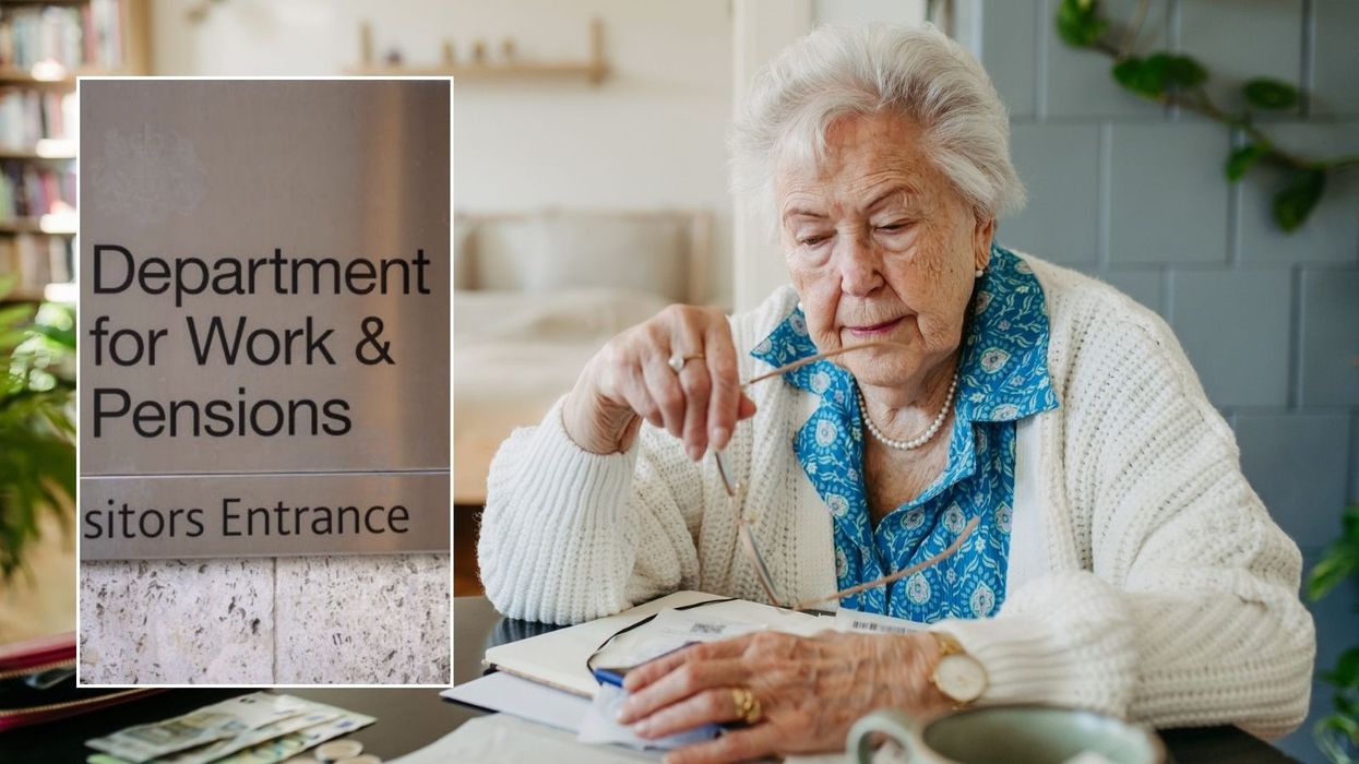 Older woman and DWP sign