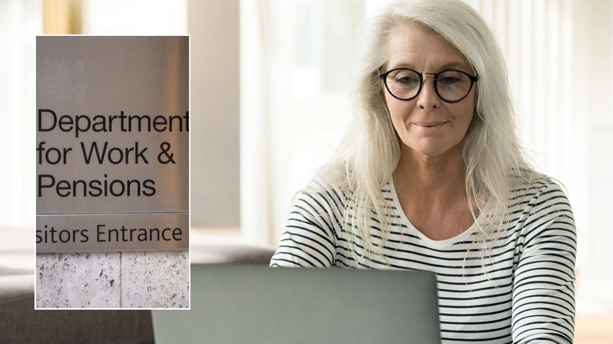 Older woman and DWP sign