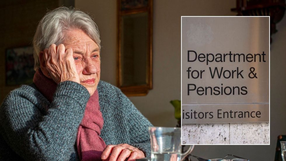 Older woman and DWP sign