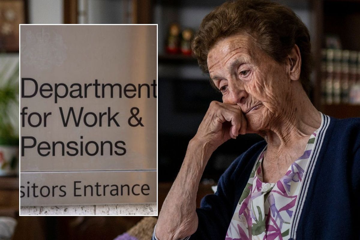 Older woman and DWP sign
