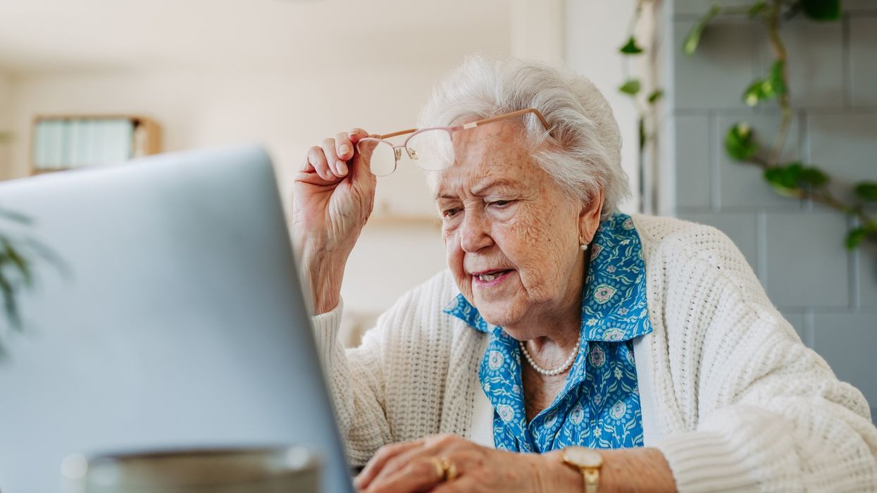 Older woman looking at laptop