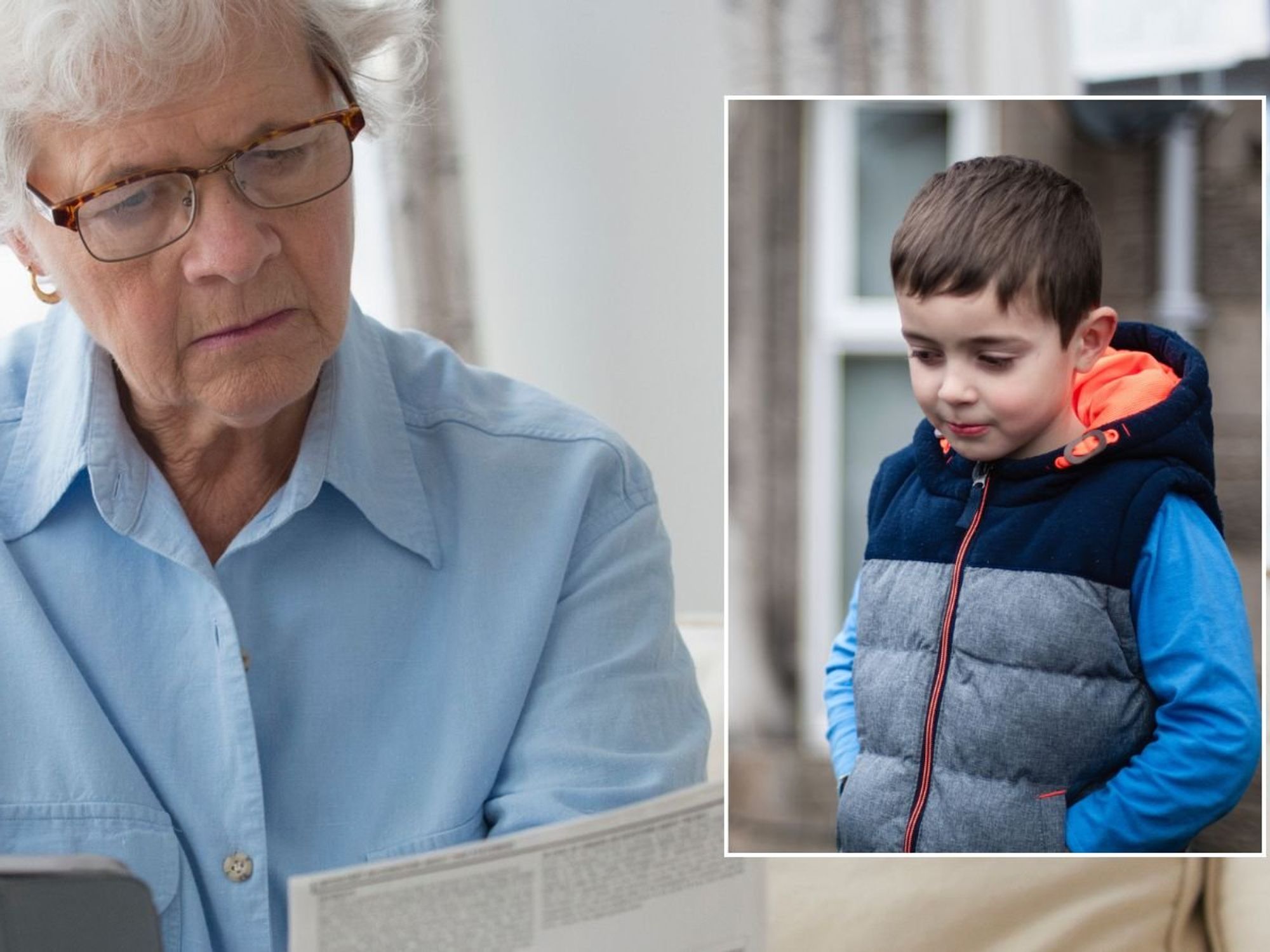 Older woman looking at letter and wee boy