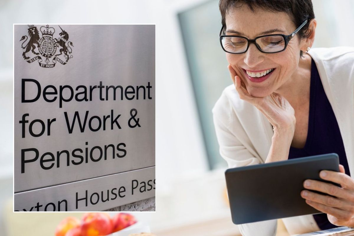 Older woman looking happy and DWP sign