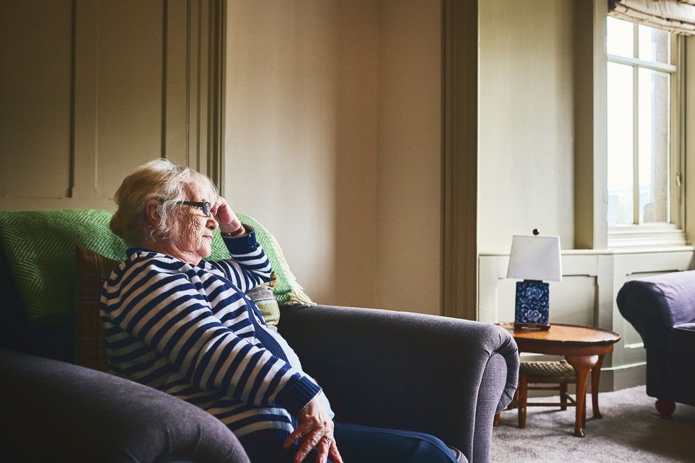 Older woman looking unhappy