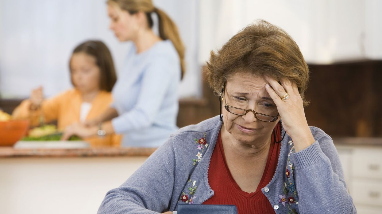 Older woman looking worried
