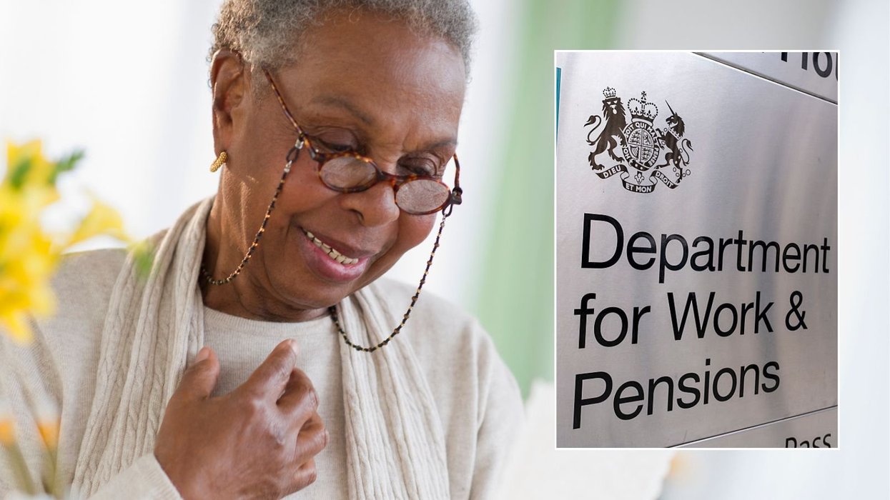 Older woman reading letter and DWP