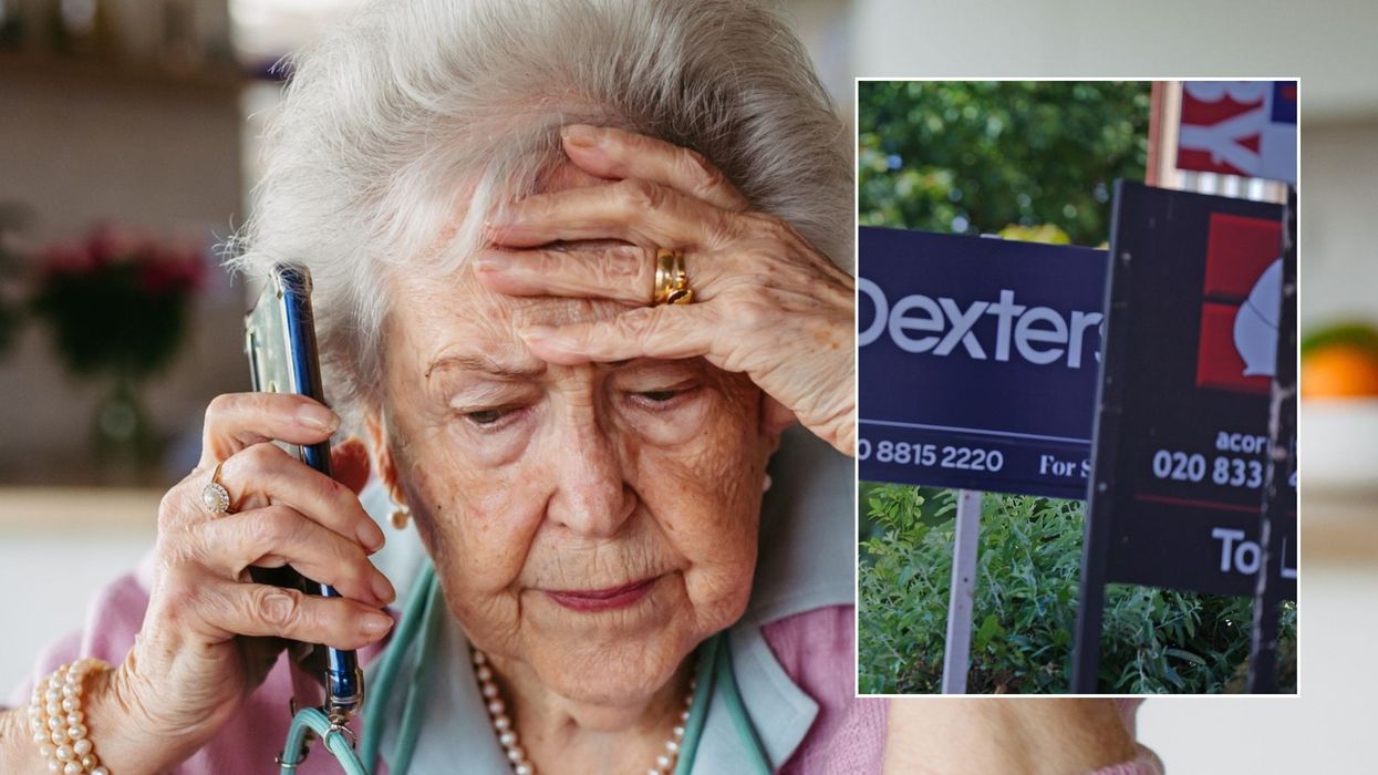 Older woman worried and house sale signs