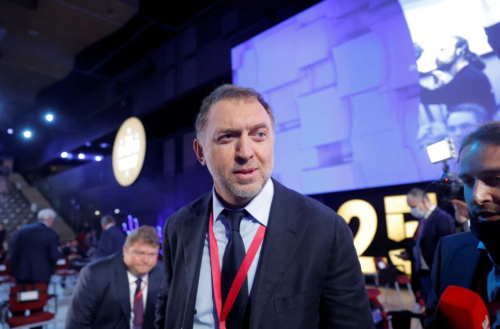 Oleg Deripaska giving an interview at a conference