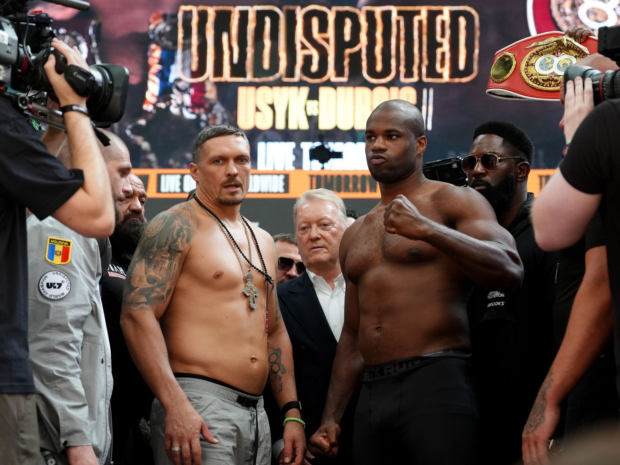 Oleksandr Usyk (left) and Daniel Dubois pictured at the weigh-in at BOXPARK